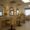 "Elegant reception area at To Beauty Hair Salon in Deerfield Beach featuring modern seating, chic decor and welcoming ambiance