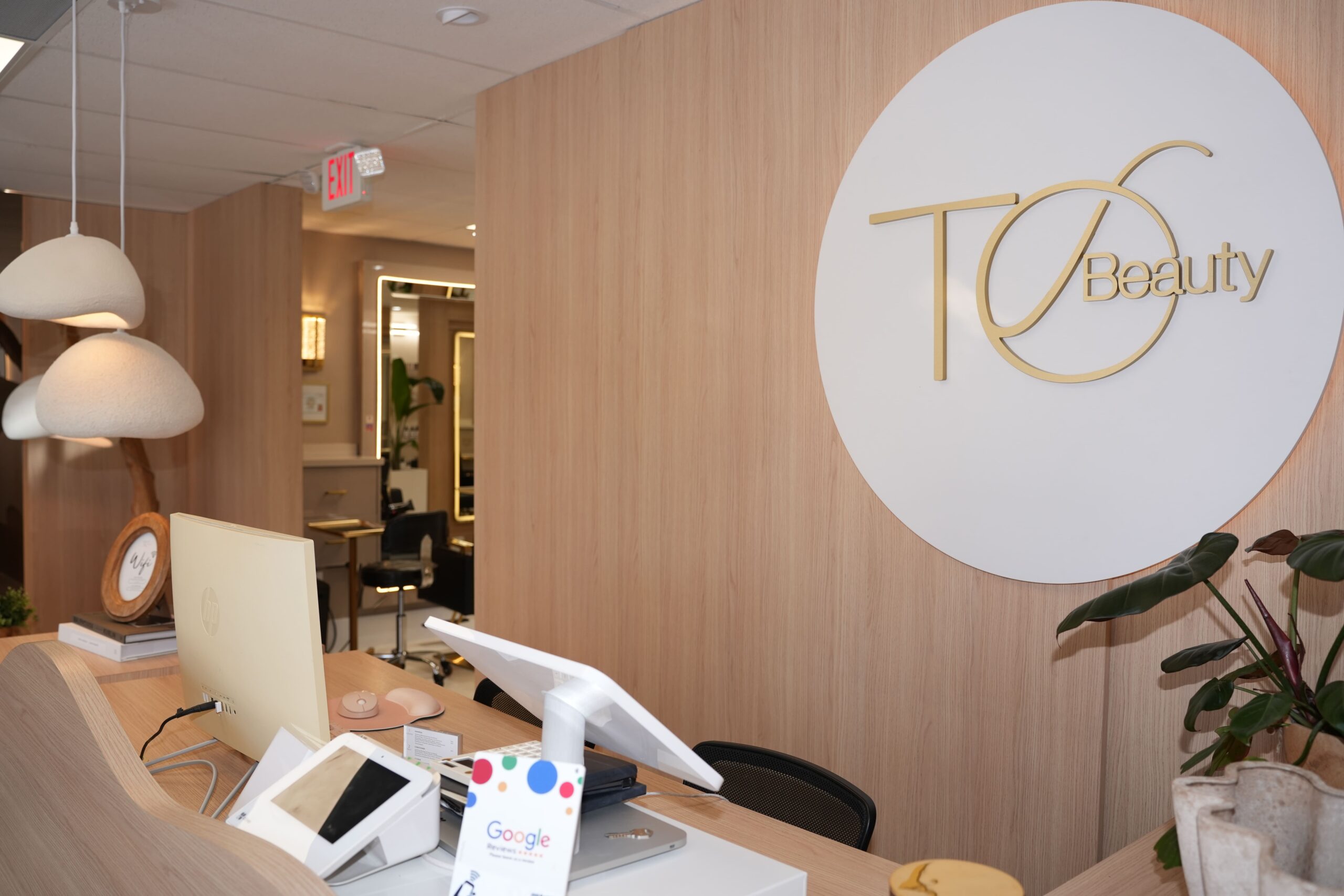 Guest enjoying a luxury hair service at ToBeautySalon in Deerfield Beach